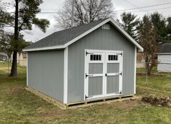 One of our Cape Cod sheds for sale in Dublin OH - Gray siding with white trimmed double doors and gray roof