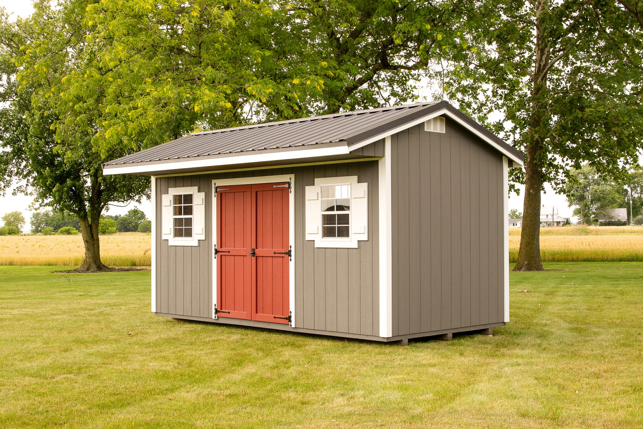 a greyish shed with white trim in Ohio