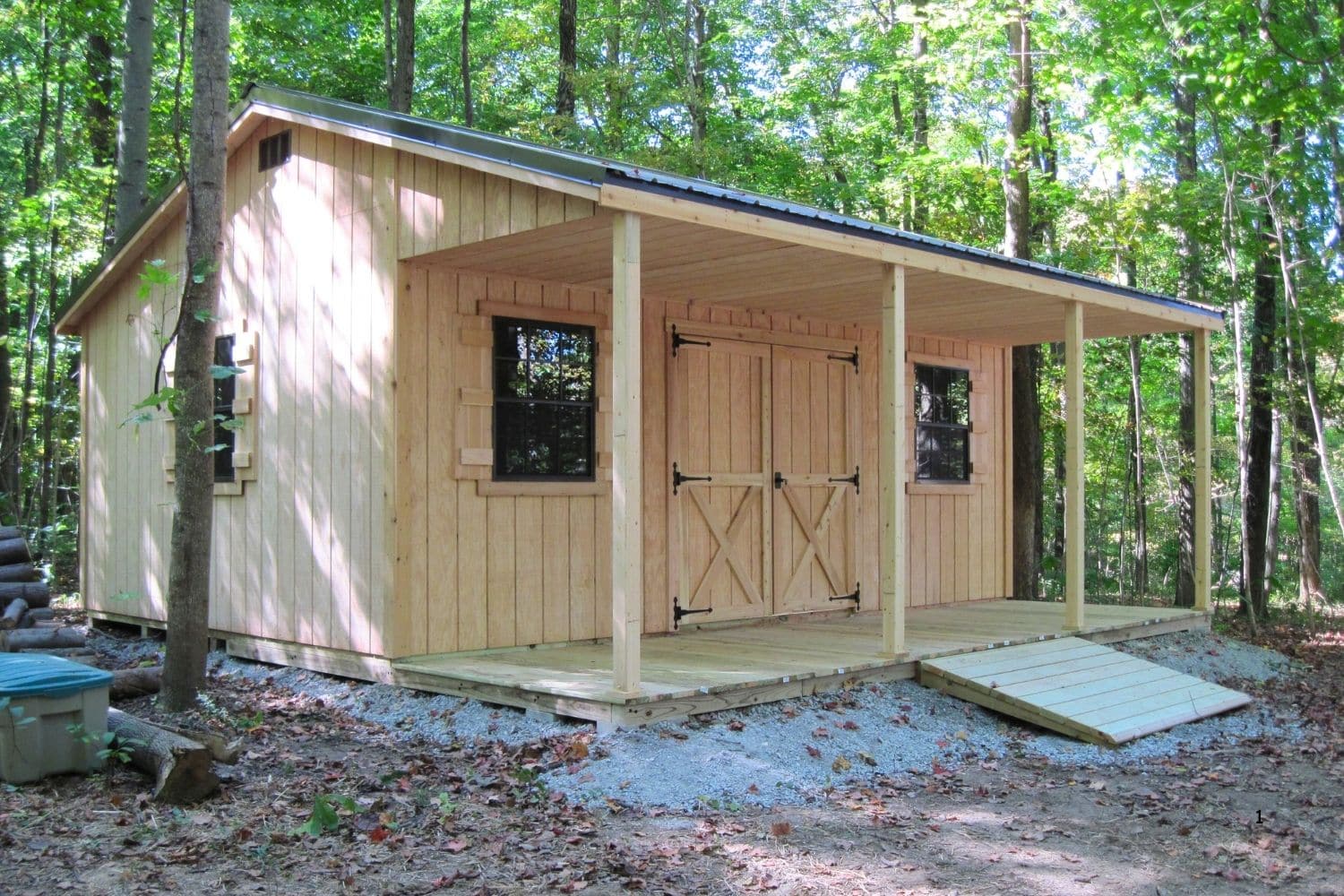 prebuilt wooden cabin with porch