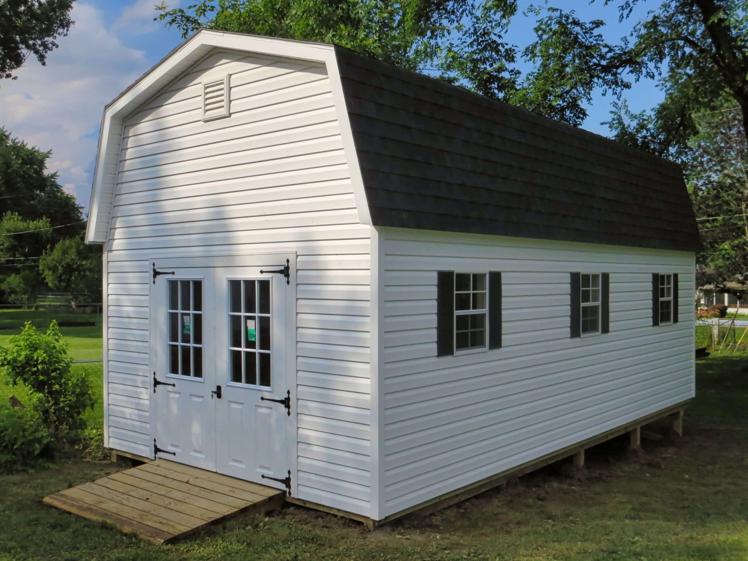 White Premier Highwall barn shed with shingle roof and double doors